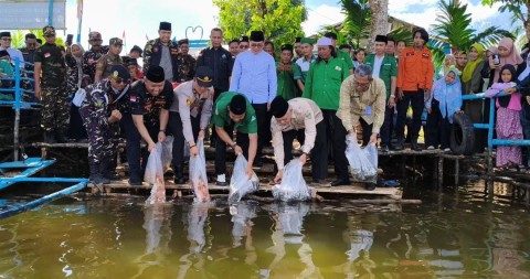 Peduli lingkungan dan Jaga Ekosistem, GP Ansor Musi Rawas Laksanakan Penenaman 1000 Pohon dan Tabur Ribuan Benih Ikan